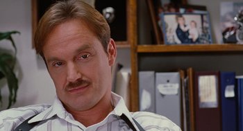 Movie still from “Jackie Brown” (1997), directed by Quentin Tarantino – A person wearing a stethoscope; Close Up shot, Low angle