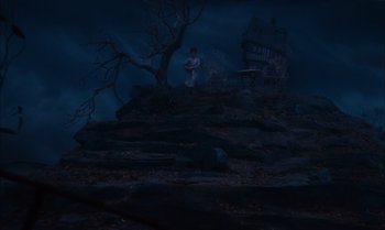 Movie still from “James and the Giant Peach” (1996), directed by Henry Selick – A man standing on top of a hill at night; Extreme Wide shot, High angle