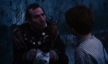 Movie still from “James and the Giant Peach” (1996), directed by Henry Selick – A man and a boy are talking to each other; Close Up shot, Over the shoulder angle
