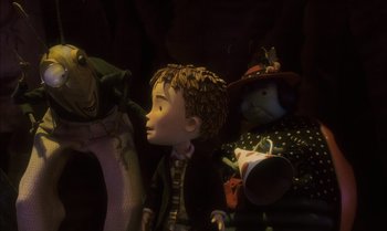 Movie still from “James and the Giant Peach” (1996), directed by Henry Selick – A group of people standing next to each other in a dark room; Medium shot, Over the shoulder angle