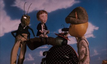 Movie still from “James and the Giant Peach” (1996), directed by Henry Selick – A group of people that are standing up in the air; Medium shot, Low angle
