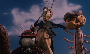 Movie still from “James and the Giant Peach” (1996), directed by Henry Selick – A group of people standing next to each other; Medium shot, Low angle