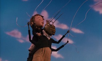 Movie still from “James and the Giant Peach” (1996), directed by Henry Selick – A puppet of a woman holding a child; Medium shot, Low angle