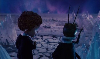 Movie still from “James and the Giant Peach” (1996), directed by Henry Selick – A couple of kids standing next to each other on a field; Medium shot, High angle