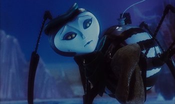 Movie still from “James and the Giant Peach” (1996), directed by Henry Selick – A doll is wearing a hat and is holding a stick; Close Up shot, Low angle
