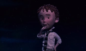 Movie still from “James and the Giant Peach” (1996), directed by Henry Selick – A cartoon of a boy in a tie and a shirt; Medium shot, High angle