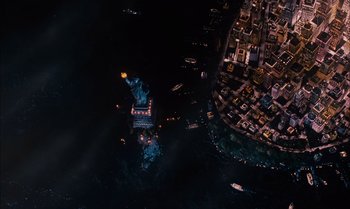 Movie still from “James and the Giant Peach” (1996), directed by Henry Selick – An aerial view of the statue of liberty at night; Extreme Wide shot, Overhead angle