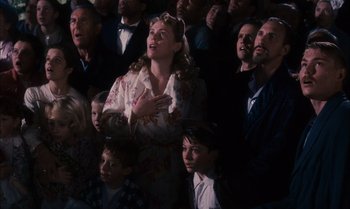 Movie still from “James and the Giant Peach” (1996), directed by Henry Selick – A group of people sitting in a room; Medium shot, Low angle