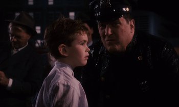 Movie still from “James and the Giant Peach” (1996), directed by Henry Selick – A man and a boy are standing next to each other; Close Up shot, Over the shoulder angle