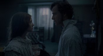 Movie still from “Jane Eyre” (2011), directed by Cary Joji Fukunaga – A man and a woman standing next to each other in a room; Medium shot, Over the shoulder angle
