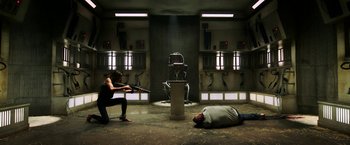 Movie still from “Jigsaw” (2017), directed by Michael Spierig – A man laying on the ground next to a woman; Wide shot, High angle
