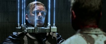 Movie still from “Jigsaw” (2017), directed by Michael Spierig – A man looking at himself in the mirror; Close Up shot, Low angle
