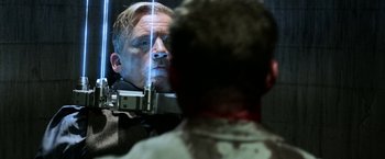 Movie still from “Jigsaw” (2017), directed by Michael Spierig – A man looking at himself in the mirror; Close Up shot, Over the shoulder angle