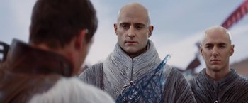 Movie still from “John Carter” (2012), directed by Andrew Stanton – A bald man with a shaved head looking at himself in a mirror; Close Up shot, Over the shoulder angle