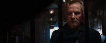 Movie still from “John Carter” (2012), directed by Andrew Stanton – A person with a beard and mustache; Close Up shot, Over the shoulder angle