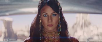 Movie still from “John Carter” (2012), directed by Andrew Stanton – A beautiful woman with long brown hair and blue eyes; Close Up shot, Overhead angle