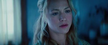 Movie still from “John Carter” (2012), directed by Andrew Stanton – A person with blonde hair; Close Up shot, Over the shoulder angle