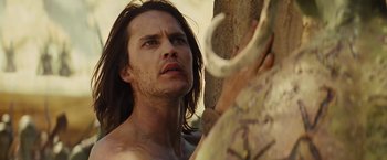 Movie still from “John Carter” (2012), directed by Andrew Stanton – A person with long brown hair; Close Up shot, Low angle