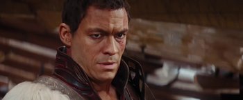 A man with a scar on his face
