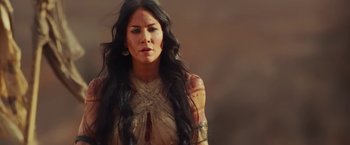 Movie still from “John Carter” (2012), directed by Andrew Stanton – A woman with long black hair wearing a white dress; Close Up shot, Low angle