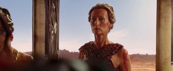 Movie still from “John Carter” (2012), directed by Andrew Stanton – A person wearing a costume; Close Up shot, Over the shoulder angle
