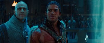 Movie still from “John Carter” (2012), directed by Andrew Stanton – A person with a tattoo on his chest; Close Up shot, Over the shoulder angle