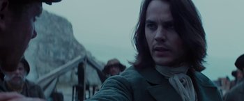 Movie still from “John Carter” (2012), directed by Andrew Stanton – A person with long brown hair; Close Up shot, Over the shoulder angle