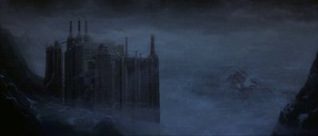 Movie still from “Judge Dredd” (1995), directed by Danny Cannon – A large building in the middle of the ocean; Extreme Wide shot, High angle
