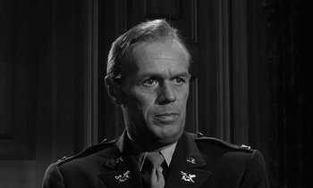 Movie still from “Judgment at Nuremberg” (1961), directed by Stanley Kramer – An old photo of a man in a military uniform; Close Up shot, Low angle