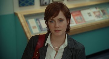 Movie still from “Julie & Julia” (2009), directed by Nora Ephron – A person wearing a jacket; Close Up shot, Over the shoulder angle