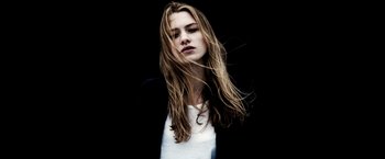 Movie still from “Juliet, Naked” (2018), directed by Jesse Peretz – A beautiful young woman with long , blonde hair; Close Up shot, Low angle