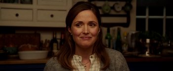 Movie still from “Juliet, Naked” (2018), directed by Jesse Peretz – A person wearing a jacket; Close Up shot, Over the shoulder angle