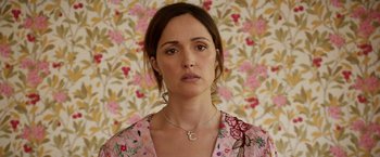 Movie still from “Juliet, Naked” (2018), directed by Jesse Peretz – A person wearing a necklace; Close Up shot, High angle