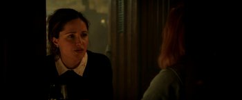 Movie still from “Juliet, Naked” (2018), directed by Jesse Peretz – Two women sitting at a table talking to each other; Close Up shot, Over the shoulder angle