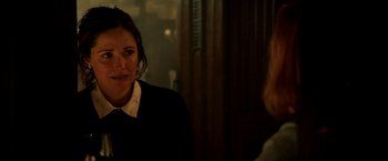 Movie still from “Juliet, Naked” (2018), directed by Jesse Peretz – A woman is talking to another woman in a room; Close Up shot, Over the shoulder angle