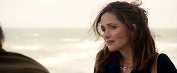 Movie still from “Juliet, Naked” (2018), directed by Jesse Peretz – A person near a body of water; Close Up shot, Over the shoulder angle