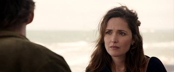 Movie still from “Juliet, Naked” (2018), directed by Jesse Peretz – A person near a body of water; Close Up shot, Over the shoulder angle