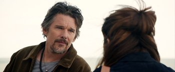 Movie still from “Juliet, Naked” (2018), directed by Jesse Peretz – A man and a woman talking to each other; Close Up shot, Over the shoulder angle