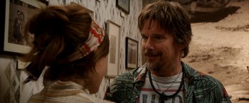 Movie still from “Juliet, Naked” (2018), directed by Jesse Peretz – A man and a woman talking to each other; Close Up shot, Over the shoulder angle