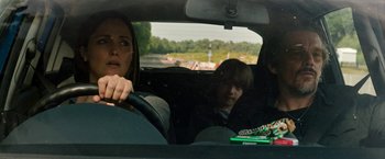 Movie still from “Juliet, Naked” (2018), directed by Jesse Peretz – A woman and a child in a car; Medium shot, Over the shoulder angle