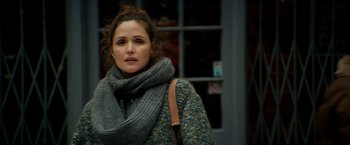 Movie still from “Juliet, Naked” (2018), directed by Jesse Peretz – A person wearing a scarf; Close Up shot, Over the shoulder angle