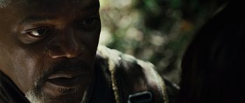 Movie still from “Jumper” (2008), directed by Doug Liman – A man's face with trees in the background; Extreme Close Up shot, High angle