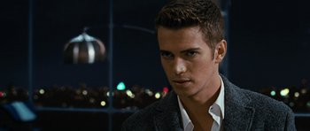 Movie still from “Jumper” (2008), directed by Doug Liman – A person wearing a suit and tie; Close Up shot, Over the shoulder angle