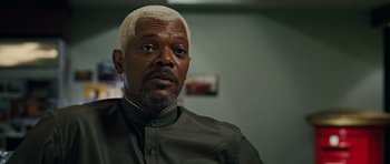 Movie still from “Jumper” (2008), directed by Doug Liman – An older man with white hair is looking at the camera; Close Up shot, High angle