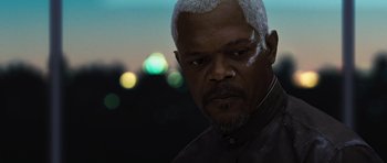 Movie still from “Jumper” (2008), directed by Doug Liman – An older man with white hair is looking at the camera; Close Up shot, Over the shoulder angle