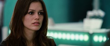 Movie still from “Jumper” (2008), directed by Doug Liman – A person with long brown hair; Close Up shot, Over the shoulder angle