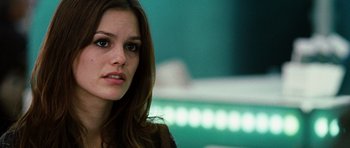 Movie still from “Jumper” (2008), directed by Doug Liman – A person with long brown hair; Close Up shot, Over the shoulder angle