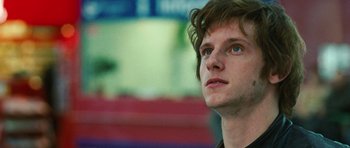 Movie still from “Jumper” (2008), directed by Doug Liman – A person looking up at the sky; Close Up shot, Low angle