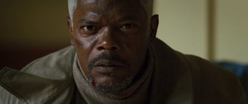 Movie still from “Jumper” (2008), directed by Doug Liman – A person with a scar on his face; Close Up shot, Low angle