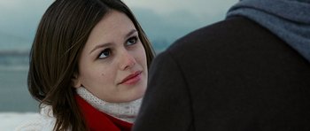 Movie still from “Jumper” (2008), directed by Doug Liman – A person wearing a red jacket; Close Up shot, Over the shoulder angle